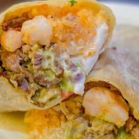 Surf N' Turf Burrito · Marinated Grilled steak, Shrimp, guacamole, sour cream, rice