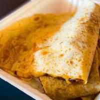 Shredded Chicken Quesadilla · Shredded Monterey Jack and Cheddar Mix and Marinated Shredded Chicken
(Chicken is Spicy)