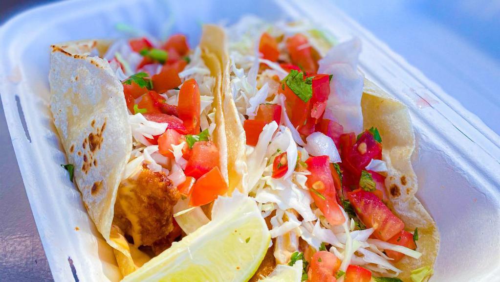 Fish Taco · Beer Battered Deep Fried Fish
Topped with Chipotle Sauce, Cabbage, and Pico de Gallo
Served on Corn Tortillas