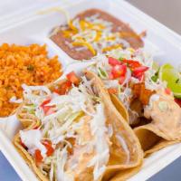 2 Fish Tacos Combo Plate · (2)Fish Tacos (Topped with Chipotle Sauce, Cabbage, and Pico de Gallo)
Served with a Side of...