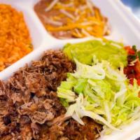 Carnitas Plate · Grilled Shredded Pork
Topped with Shredded Lettuce and Guacamole
Served with Rice, Beans, an...