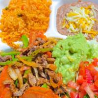 Fajitas Plate · Marinated Chicken or Steak, Grilled with Tomato, Bell Pepper and Onion
Topped with Shredded ...