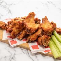 Jumbo Wings (15-Pc Large Pack) · 15 crisp fried golden-brown wings tossed in the sauce of your choice.