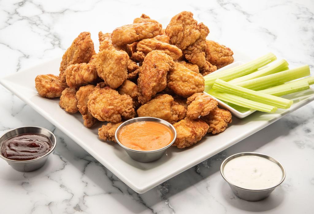Boneless Wings (20-Pc Party Pack) · 20 boneless chicken wings tossed in your choice of sauce.