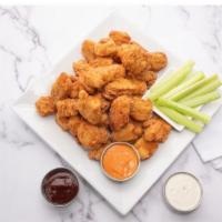 Boneless Wings (40-Pc Football Pack) · 40 boneless chicken wings tossed in your choice of sauce.