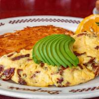Apple Smoked Bacon, Avocado & Jack Cheese Omelette · Three-eggs served with house-made golden hashed browns and hot buttered toast or Du-par’s mu...