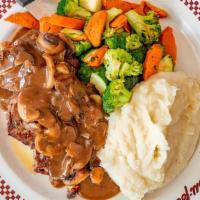 Gourmet Meatloaf · Served on brioche bread with a rich mushroom gravy. Presented open-faced with creamy mashed ...