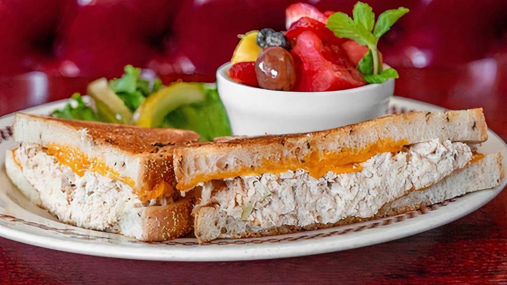 Tuna Melt Sandwich · Choice of American, cheddar, Jack, or swiss on grilled rye bread. Served with choice of side.