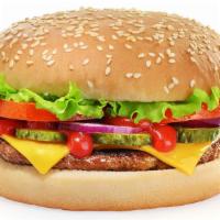 The Hamburger · Juicy beef patty with  lettuce, tomatoes, onions wrapped in a  bun.