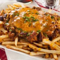 Chili Cheese French Fries · Crispy golden french fries loaded with hearty chili and melted cheese.