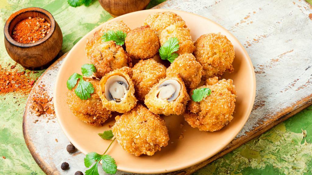 Crispy Mushrooms · Hearty mushrooms battered then crisped to perfection.