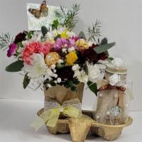 Beautiful Coffee  · Bottled Starbucks coffee and assorted composition with flowers and candy (candy may not be t...