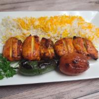 Chicken Thigh Kebab · Includes rice, salad, grilled jalapeño, tomato, hummus, pita bread & sauce.