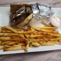 Gyro Wrap · Comes with fries & drink .
