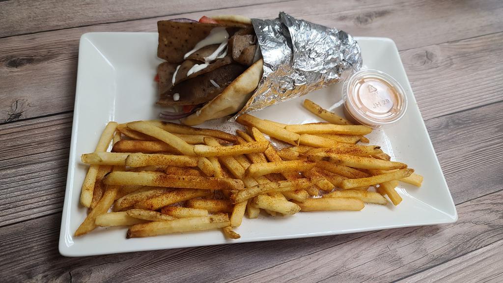 Gyro Wrap · Comes with fries & drink .
