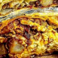 Chorizo Breakfast Burrito · Chorizo, potatoes, eggs, cheese, and choice of salsa.