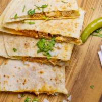 Beans + Rice Quesadilla · Hand Made Flour Tortilla, Freshly Daily Made Re Fried Beans, Mexican Rice in a Cheese Quesad...