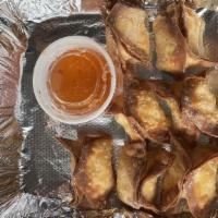 Crab Rangoon · Fried imitation crab and cheese wrapped in wonton sheet served with sweet & sour sauce.