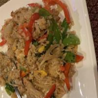 Spicy Fried Rice · Spicy. Stir-fried rice with egg, garlic, basil, carrot, snow pea, bell pepper, onion, and ch...