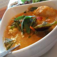 Panang Curry · Spicy. Coconut milk, green bean, pea and carrot, bell pepper, and basil in panang curry paste.