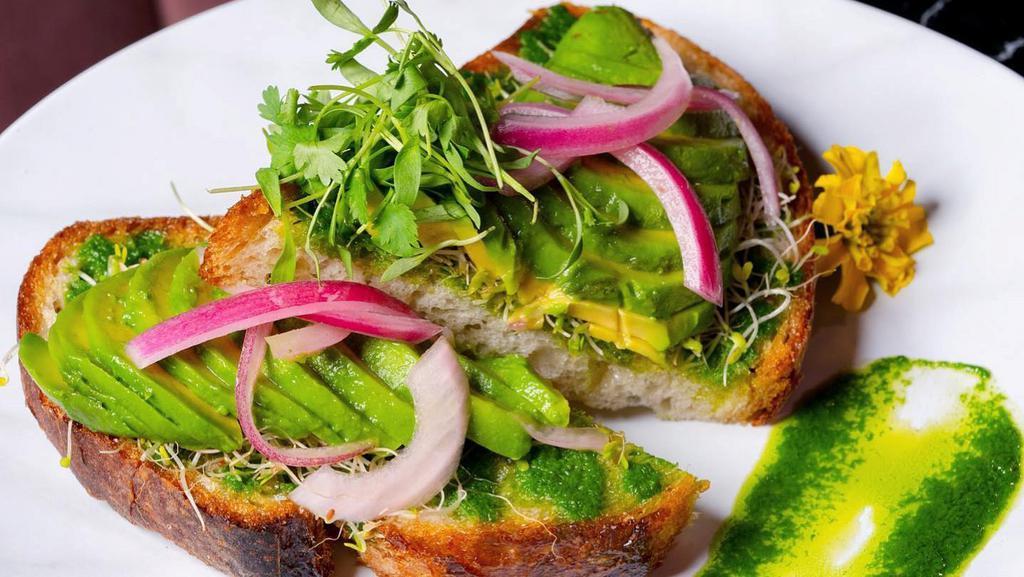 Avocado Toast · Thick sourdough slice, sprouts, pickled onions & cucumber, arugula pesto