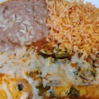 Chile Rellenos · Served with rice, beans, and tortillas.
