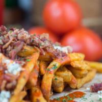 Buffalo Fries · Seasoned fries topped with buffalo sauce, ranch, applewood, bacon, Cheddar cheese & grilled ...