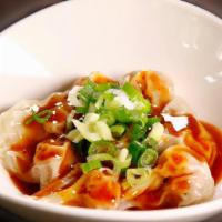 Spicy Shrimp & Pork Wontons (6 Pieces) · Shrimp and pork wontons served with our house-made chili oil sauce and topped with garlic an...