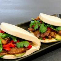 Bbq Pork Belly Buns (2 Pieces) · Homemade BBQ sauce braised pork belly, bell pepper, cucumber, cilantro with steamed buns.