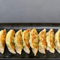Vegetable Potstickers (10 Pieces) · Vegetarian. 100% vegetarian. Spinach, carrot, cabbage, corn, water chestnuts, vermicelli, sh...