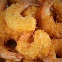 Popcorn Shrimp (8 Oz) · Seasoned shrimp coated with crushed popcorn then deep-fried and served with cocktail sauce d...