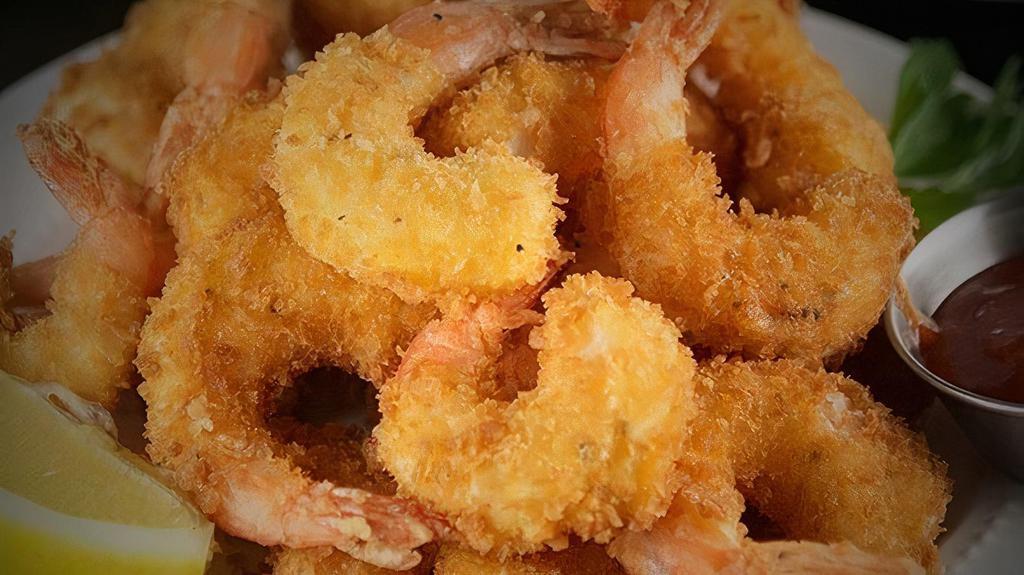 Popcorn Shrimp (8 Oz) · Seasoned shrimp coated with crushed popcorn then deep-fried and served with cocktail sauce dip.