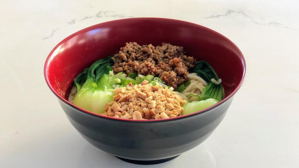 Dan Dan Noodle · Boiled noodles with sesame-peanuts sauce, minced pork, baby bok choy, chili oil, chopped peanuts. Choose: spicy, mild or non-spicy.