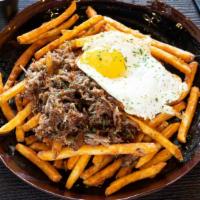 Oxtail Truffle Fries · Thinly sliced potatoes, braised oxtail n truffle seasoning serve w sunny side up egg