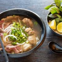 Beef Pho · House special beef pho noodle soup with one choice of either brisket, rare filet mignon or m...