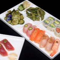 Yakumi Plus · Edamame, choice of salad, choice of two rolls, big eye tuna 2 pcs, yellowtail 2 pcs, salmon ...