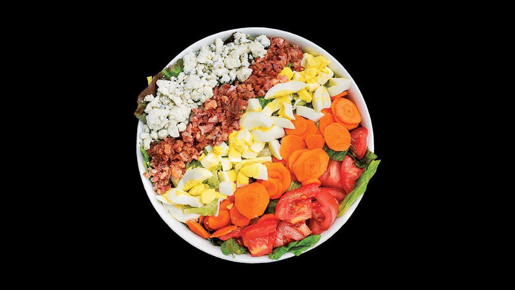 Cobb Salad · Salata mix greens, tomatoes, carrots, eggs, bacon, blue cheese and grilled chicken, served with buttermilk ranch dressing on the side.
