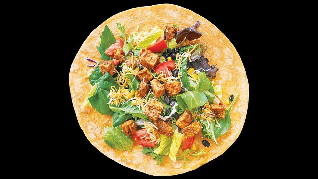 Southwest Wrap · Salata mix greens, tomatoes, corn, black beans, cheddar cheese, spicy chipotle chicken, and spicy chipotle ranch dressing in a southwest tortilla.