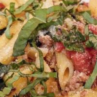 Penne Pasta With Sausage & Rapini · Spicy Italian sausage, shallots, garlic, fresh herbs, anchovy, and white wine finished with ...