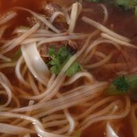 #3 Beef Noodle Soup · Cooked brisket, rice noodle, green onion, cilantro, white onion served in a rich earthiness ...