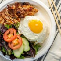 #13 Grilled Chicken & Egg On Rice · Chicken marinated with lemongrass, grilled to perfection, served with jasmine rice, in a fri...