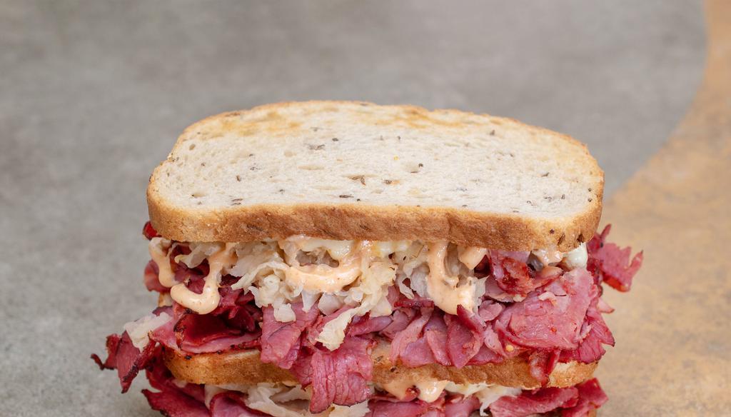 Full Pastrami Reuben · Lean Beef Pastrami
On our Italian Loaf or Sliced Sour Rye.
Provolone or Swiss Cheese topped with
our House Russian Dressing and Sauer Kraut served with 
Pickle Spears On The Side
