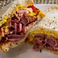 Half Pastrami Classic · Italian loaf or Sliced Sour Rye.
Swiss Cheese or Provolone Cheese.
Mayo, Muster, Dijon, Russ...