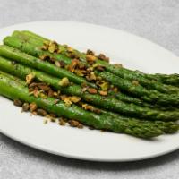 Seasonal Asparagus · Crushed pistachios, lemon confit butter.