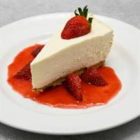 Cheesecake · Pecan crust & strawberry sauce.