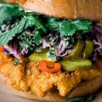Organic Fried Chicken Sandwich · Favorite. Served on a Kaiser roll with sesame panko breaded  chicken breast, bread and butte...