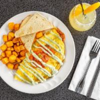 Cancun Omelette · Chorizo black bean chili, avocado pulp, jack and cheddar cheese with salsa fresca and jalape...