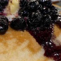 Blueberry Pancakes · 3 short of stack pancake, top with melt blueberries.