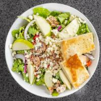 Granada Salad · Romaine lettuce, apple, roasted peppers, red onions, caramelized walnuts, feta cheese tossed...