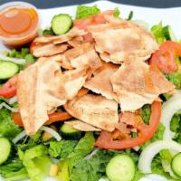 Fatoush Salad · Vegetarian. Lettuce, tomato, onion, cucumber, sumac, olive oil, lemon juice & toasted pita b...